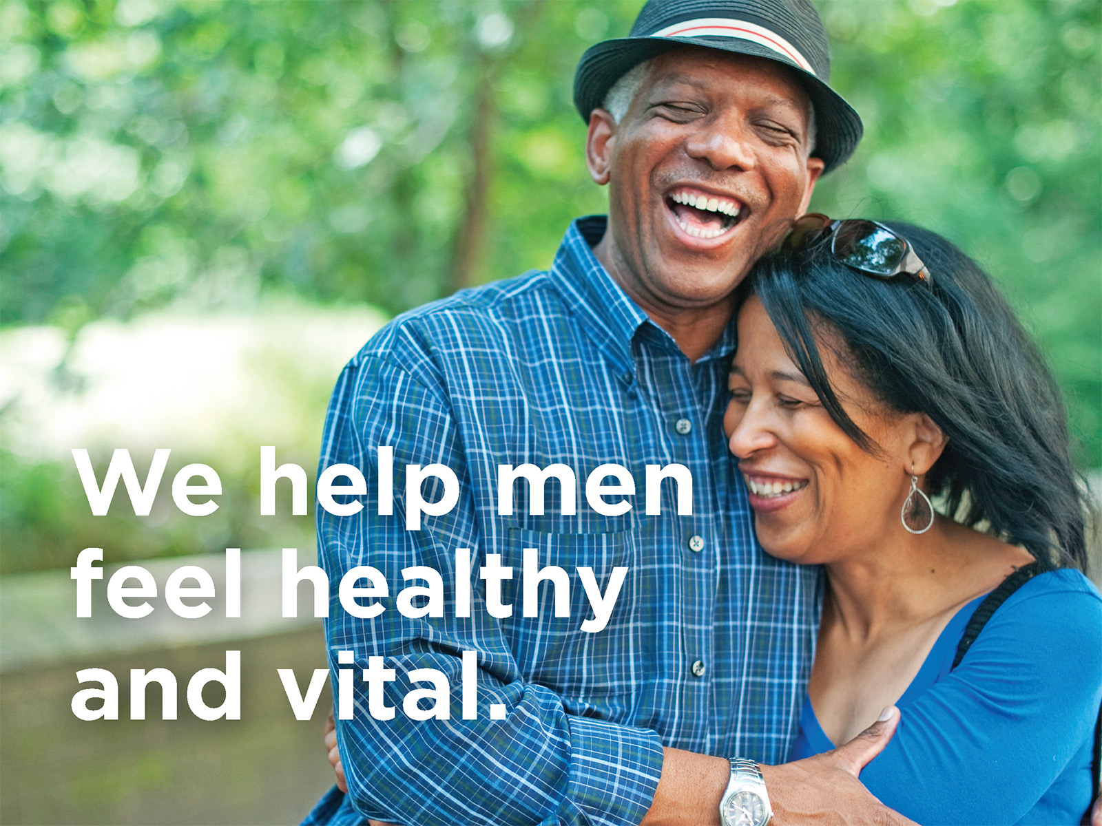 image of senior couple smiling. Text overlay We help men feel healthy and vital.
